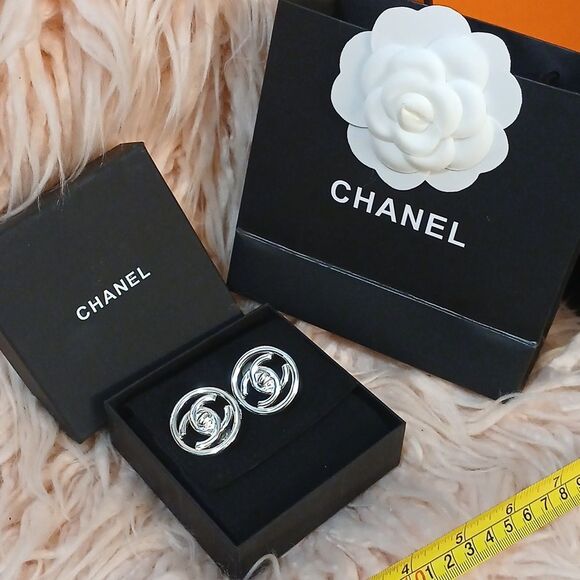 Authentic CHANEL Silver Logo Turnlock Clip On Earrings - Picture 1 of 6